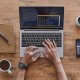 top down view: Man working with a laptop